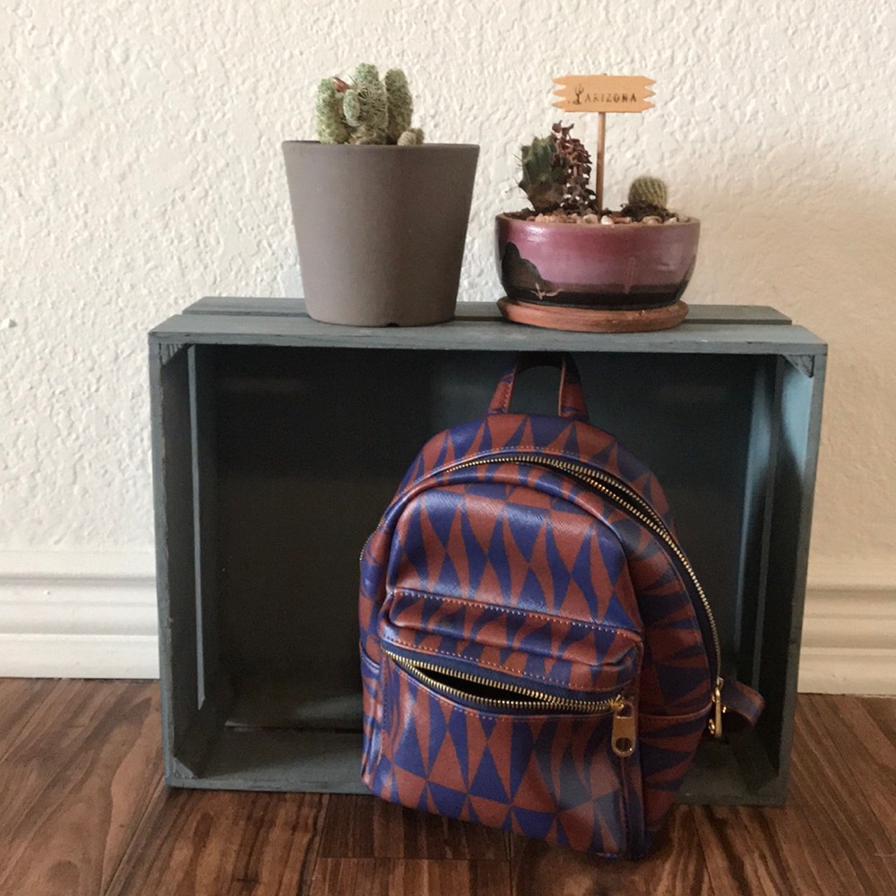 Two-toned geometric shaped mini backpack